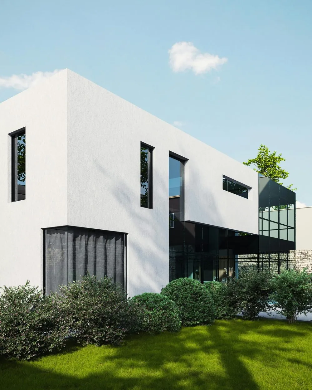 Weißes Einfamilienhaus mit Garten